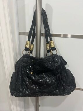 Elegant Black Braided Shoulder Bag with Gold Accents